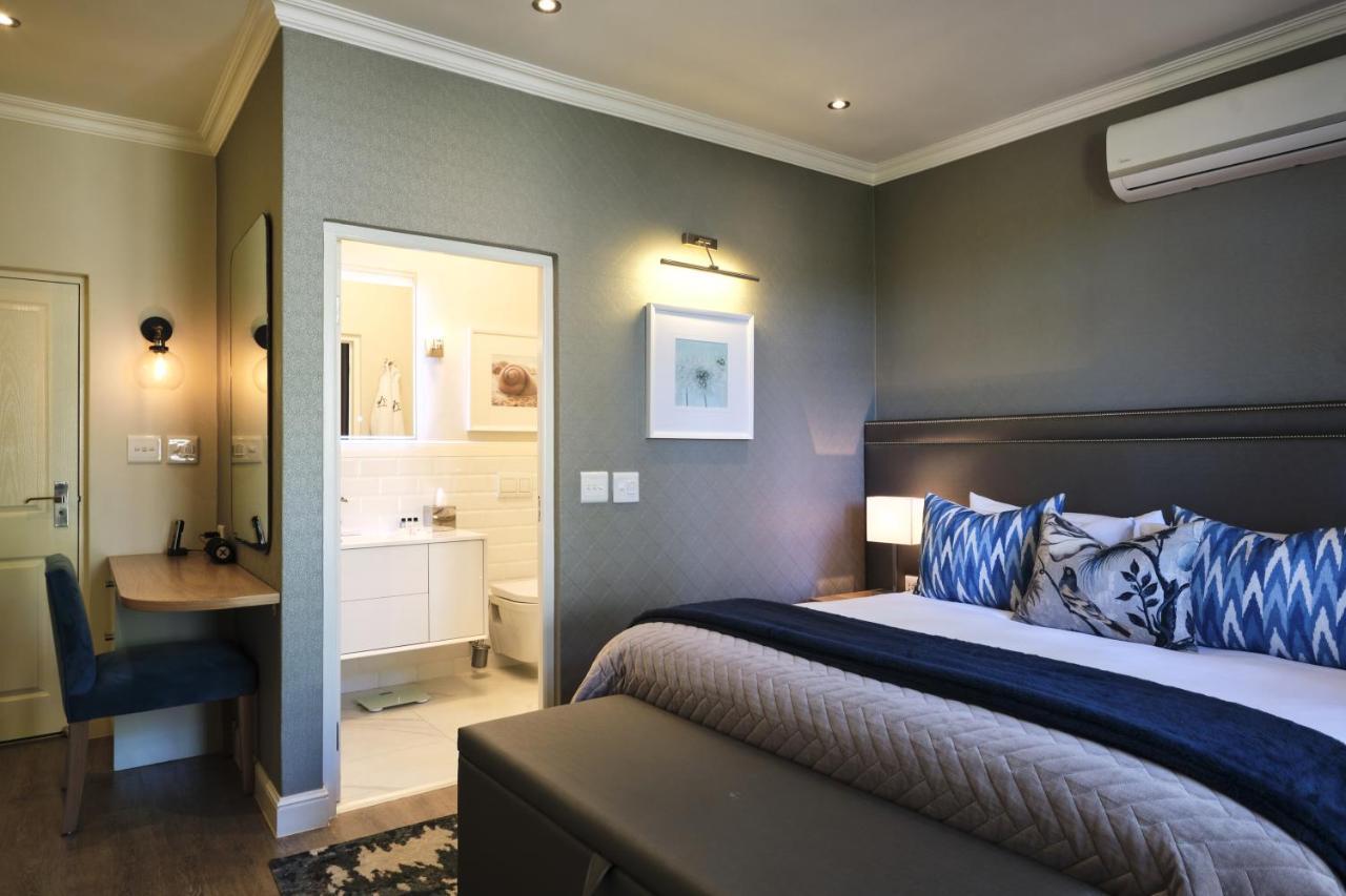 Alluvia Boutique Winery&Luxury Accommodation Stellenbosch Extérieur photo A bedroom at the Oyster Box