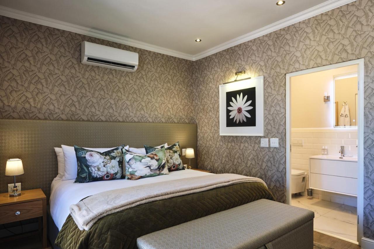 Alluvia Boutique Winery&Luxury Accommodation Stellenbosch Extérieur photo A bedroom at the Cape Heritage